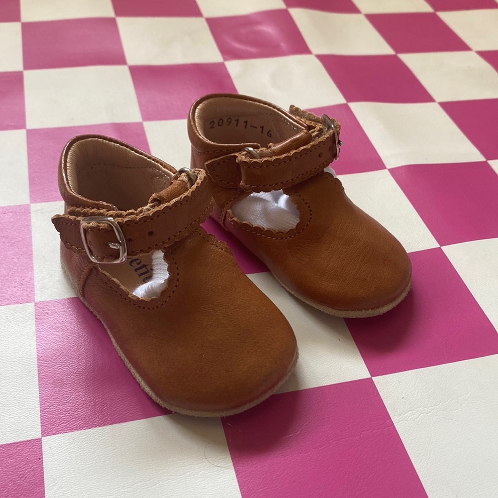 Petit Nord. She never got to wear them. Adorable